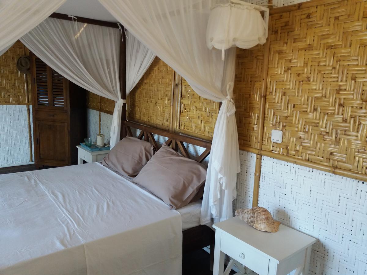 Wera Beach Kadumbul ภายนอก รูปภาพ