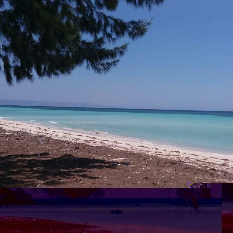 Wera Beach Kadumbul ภายนอก รูปภาพ